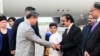 This handout photo taken July 30, 2023, and released by the Pakistan Information Department (PID) shows Pakistan's Interior Minister Rana Sanaullah (2nd R) receiving visiting Chinese Vice Premier He Lifeng (2L) upon his arrival in Islamabad.