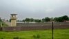 A guard is seen atop a watch tower at Attock prison where Pakistan's former Prime Minister Imran Khan was taken following his conviction a day earlier on corruption charges, in Attock, Pakistan, Aug. 6, 2023. 