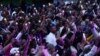 An audience shows appreciation with flashlights as Rapper Doug E. Fresh performs during a Juneteenth concert on the South Lawn of the White House in Washington, June 10, 2024. Many Americans people celebrate Juneteenth by honoring African American culture through arts and music.