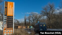 At an abandoned gas station in New York, Ukraine, the owners decided to display the new name of the city in Ukrainian, on Feb. 20, 2023.