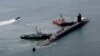 Атомная подводная лодка USS Michigan на военно-морской базе в Пусане, Южная Корея, 16 июня 2023 года.