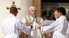 Pope Francis attends a mass to canonise two new Saints, Giovanni Battista Scalabrini and Artemide Zatti in St. Peter's Square, at the Vatican, Oct. 9, 2022. 