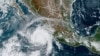 This satellite image taken at 15:30 UTC and provided by NOAA shows Hurricane Roslyn approaching the Pacific coast of Mexico, Oct. 22, 2022.