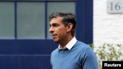 British Conservative MP Rishi Sunak leaves his home address in London, Oct. 22, 2022. 