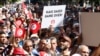 Protesters rally against Tunisian President Kais Saied, in Tunis, Oct. 15, 2022.