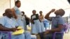 FILE - Malawian journalist, Kenneth Jali taking cholera vaccine , during the launch of the campaign in Blantyre, May 23, 2022. (Lameck Masina/VOA)