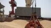 Wheat grain is seen on the MV Brave Commander vessel from Yuzhny Port in Ukraine to the drought-stricken Horn of Africa as it docks in Djibouti, Aug. 30, 2022. (Hugh Rutherford/World Food Program/Handout via Reuters)