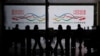 FILE - Travelers at Hong Kong International Airport after the lifting of coronavirus disease (COVID-19) movement controls in Hong Kong, China, Dec. 14, 2022.