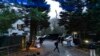 The access road to President Joe Biden's home in Wilmington, Del., is seen from the media van Friday, Jan. 13, 2023. (AP Photo/Carolyn Kaster)