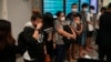 Malaysian youths rescued from human traffickers in Cambodia arrive at the Kuala Lumpur Airport Terminal in Sepang, Oct. 6, 2022. Another 21 Malaysians rescued from human traffickers in Cambodia and Laos returned to the country Thursday.
