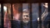 Egypt Arrests 2 Top Islamists, Sets Date for Morsi Sentence