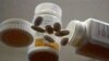 Samples of Nevirapine, an antiretroviral AIDS drug used since the 1990s, are displayed at the National Institutes of Health in Memphis, Tenn. (AP Photo/APTN)