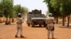 FILE - Soldiers of the U.N. peacekeeping mission in Mali, MINUSMA, patrol in the streets of Gao, Mali, July 24, 2019. Three peacekeepers were killed and three injured when their vehicle hit a bomb in Mali on Oct. 17, 2022.