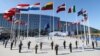 Прапори країн-членів Альянсу біля нової штаб-квартири НАТО в Брюсселі