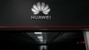 A technician stands at the entrance to a Huawei 5G data server center in Guangzhou, in southern China's Guangdong province on Sept. 26, 2021. 
