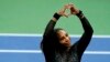 Serena Williams, of the United States, makes a heart sign to fans after losing to Ajla Tomljanovic, of Austrailia, during the third round of the US Open tennis championships, Sept. 2, 2022, in New York. 