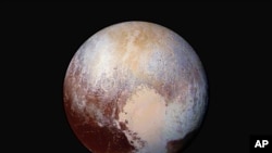 A journey to Pluto reveals a close-up view of mountains of water in frozen fields of nitrogen and methane. 