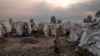 People displaced by ongoing fighting gather at a refugee camp on the outskirts of Goma, Democratic Republic of the Congo, on July 11, 2024.
