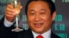 中国铝业巨头忠旺集团董事长刘忠田庆贺该集团在香港上市（2009年5月8日）