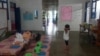 Salah seorang dari tiga anak penderita HIV di Pulau Samosir, Sumatera Utara, masih aman dan tidak diusir warga. (Foto: Anugrah/VOA)