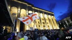 Протести проти суперечливого законопроєкту про "іноземний вплив" у Тбілісі, Грузія, 14 травня 2024 року. Giorgi ARJEVANIDZE/AFP
