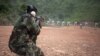 Un soldat des Forces armées centrafricaines lors d'une séance d'entraînement au camp Kassai, à Bangui, le 14 mars 2018.