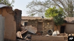 A house is left burned following an attack by gunmen in Bokkos, Nigeria, on Dec. 26, 2023. Nigerian officials and survivors say at least 140 people were killed by gunmen who attacked remote villages in north-central Nigeria's Plateau state.