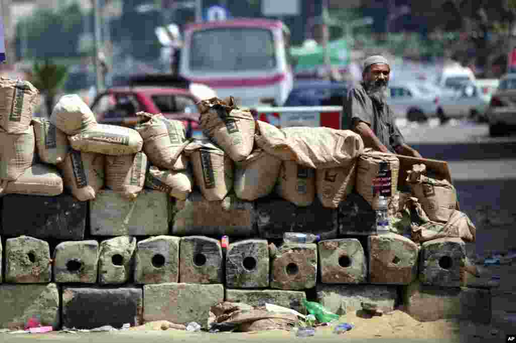 Sand barriers set up by protesters near Cairo University in Giza, Egypt, July 23, 2013.
