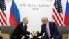 Russia's President Vladimir Putin and U.S. President Donald Trump shake hands during a bilateral meeting at the G-20 leaders summit in Osaka, Japan, June 28, 2019.