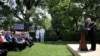 President Donald Trump speaks about his administration's proposals to change U.S. immigration policy as members of his cabinet and others listen in the Rose Garden of the White House in Washington, May 16, 2019. 