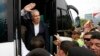 FILE - Organization of American States Secretary-General Luis Almagro waves to Venezuelan migrants in La Parada, Colombia, Sept. 14, 2018. Almagro is facing a probe of allegations he had a romantic relationship with a staff member that may have violated OAS ethics policies.