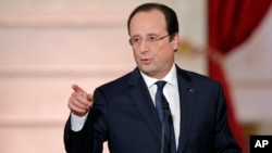 French President Francois Hollande at a news conference, Jan.14, 2014.