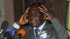 Zimbabwe's President Robert Mugabe speaks at the start of a conference of parties and civic society groups reviewing a draft constitution that, if adopted, will lead to Zimbabwe's next election, at a hotel in Harare, October 22, 2012.