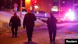 Une patrouille policière à Québec, le 29 janvier 2017.