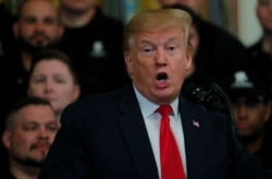President Donald Trump speaks at the Wounded Warrior Project Soldier Ride event after the release of Special Counsel Robert Mueller's report in the East Room of the White House, April 18, 2019.