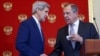 FILE - U.S. Secretary of State John Kerry (L) and Russia's Foreign Minister Sergei Lavrov shake hands during a joint news conference at the Kremlin in Moscow, Dec. 15, 2015. 