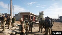 Les forces irakiennes à l'est de Mossoul, en Irak, le 22 décembre 2016.