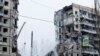 Aftermath of Dnipro apartment block destruction following missile strike