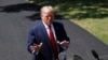 FILE - President Donald Trump speaks with reporters on the South Lawn of the White House, in Washington, Aug. 21, 2019.