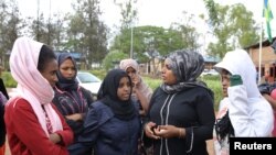 Asylum-seekers who arrived from Libya, are seen at the United Nations emergency transit center in Gashora, Rwanda, Oct. 23, 2019.