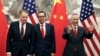 FILE - Chinese Vice Premier Liu He (R) gestures as U.S. Treasury Secretary Steven Mnuchin (C) chats with his Trade Representative Robert Lighthizer (L) before their meeting in Beijing, May 1, 2019. 