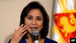 Philippine Vice President Leni Robredo, seen in this Dec. 5, 2016 photo, has criticized Duterte's bloody anti-drug crackdown and other policies, but the president said she has the right to free speech and that removing her from office would damage the country, Thursday, March 23, 2017.