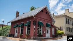This photo shows the Red Hen Restaurant in downtown Lexington, Va., June 23, 2018. White House press secretary Sarah Sanders said Saturday in a tweet that she was booted from the Virginia restaurant because she works for President Donald Trump.