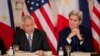 Philippines Secretary of Foreign Relations Albert Del Rosario, left, speaks while Secretary of State John Kerry listens during a meeting between the U.S. and the Philippines delegation in Washington on Jan. 12, 2016.