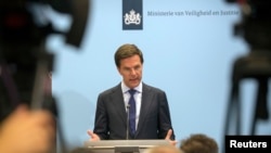 Perdana Menteri Belanda Mark Rutte dalam sebuah konferensi pers Den Haag 18 Juli 2014. Pemimpin dunia serukan investigasi penembakan jatuh pesawat Malaysian Boeing 777 di Ukraina Timur.