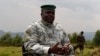 Congolese M23 rebel leader Bisimwa Bertrand speaks to the media in Bunagana, Aug. 2, 2013. 