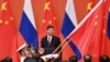 中国国家主席习近平2018年6月8日在北京人大会堂外参加为欢迎俄罗斯总统普京而举行的欢迎仪式。