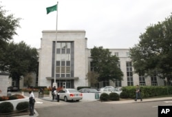 FILE - A car pulls onto the grounds of Saudi Arabia's embassy in Washington, Oct. 11, 2011. The interests of the kingdom are reportedly represented by more than two dozens lobbying firms in the U.S. capital.