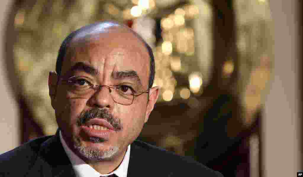 Meles speaks to reporters after meeting with Egyptian Prime Minister Essam Sharaf in Cairo, Egypt, September 17, 2011.