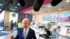 US President Joe Biden speaks to members of the media as he visits a Baskin-Robbins ice cream shop in Portland, Ore., Oct. 15, 2022.